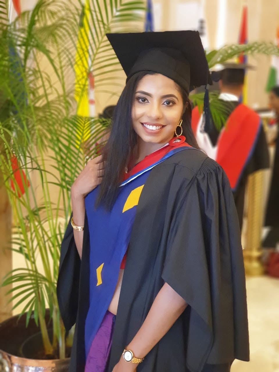 Sandani in graduation gown and cap, University of Bedfordshire